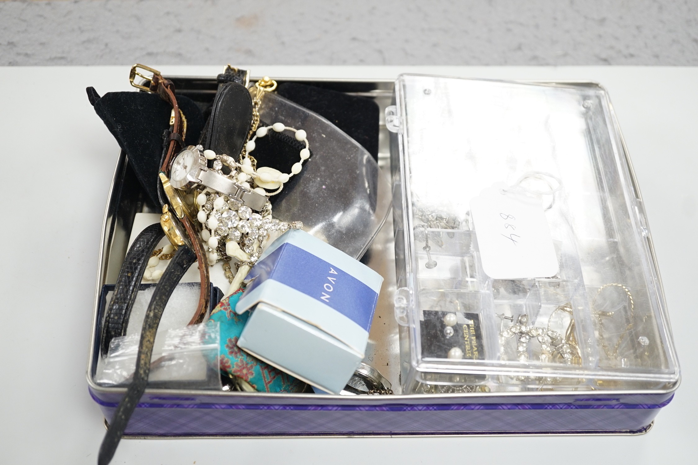 A small quantity of assorted costume jewellery and wrist watches.